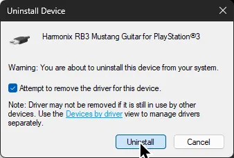 The device uninstall prompt. 'Attempt to remove the driver for this device' is ticked and the cursor is over 'Uninstall.'