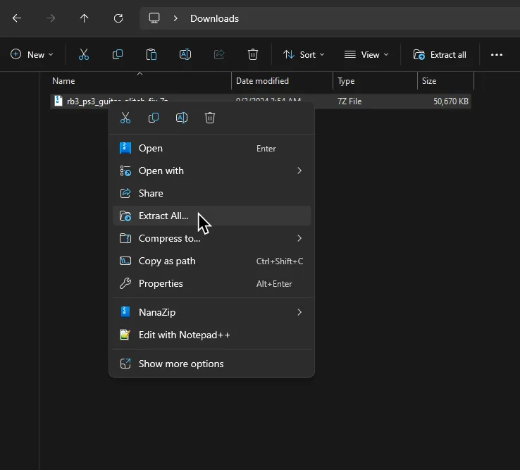 El archivo rb3_ps3_guitar_glitch_fix.7z siendo extraído.