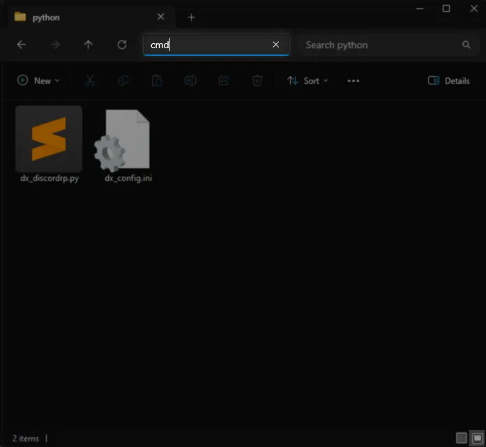 A file browser window with 'cmd' typed into the address bar.