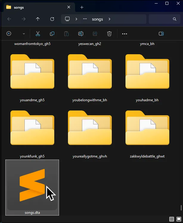 A 'songs.dta' file selected with a cursor over it.