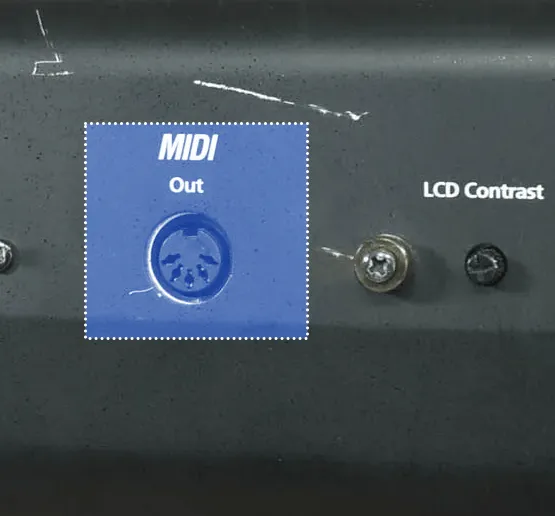 The back of a MIDI controller showing a 5-DIN MIDI input and output highlighted in yellow with a solid white outline, and multiple pedal inputs.