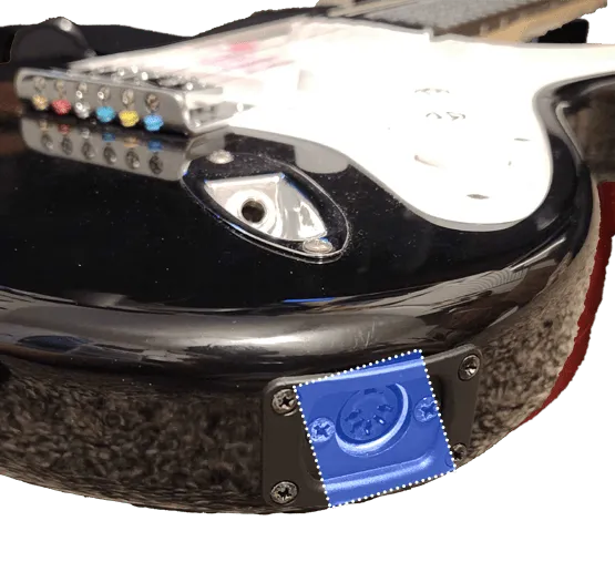 A Rock Band 3 Squier Stratocaster Pro Guitar showing a 5-DIN MIDI output highlighted in blue with a dotted white outline.